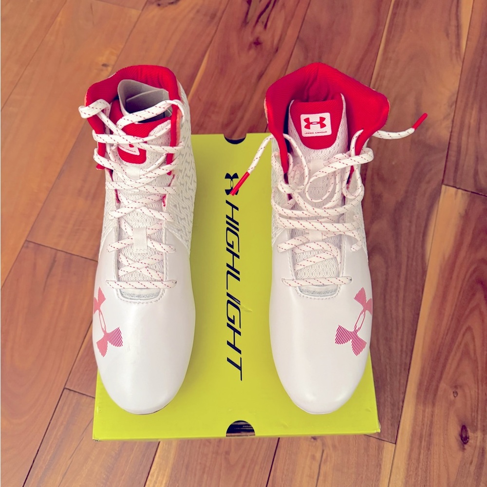 New Under Armor red and white cleats size 8